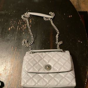 Very good cond Kate spade purse. Approx. dim with flap closed is 8in x 7in